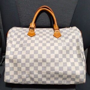 Louis Vuitton Damier Azur Canvas Handbag
Date Code TH1026